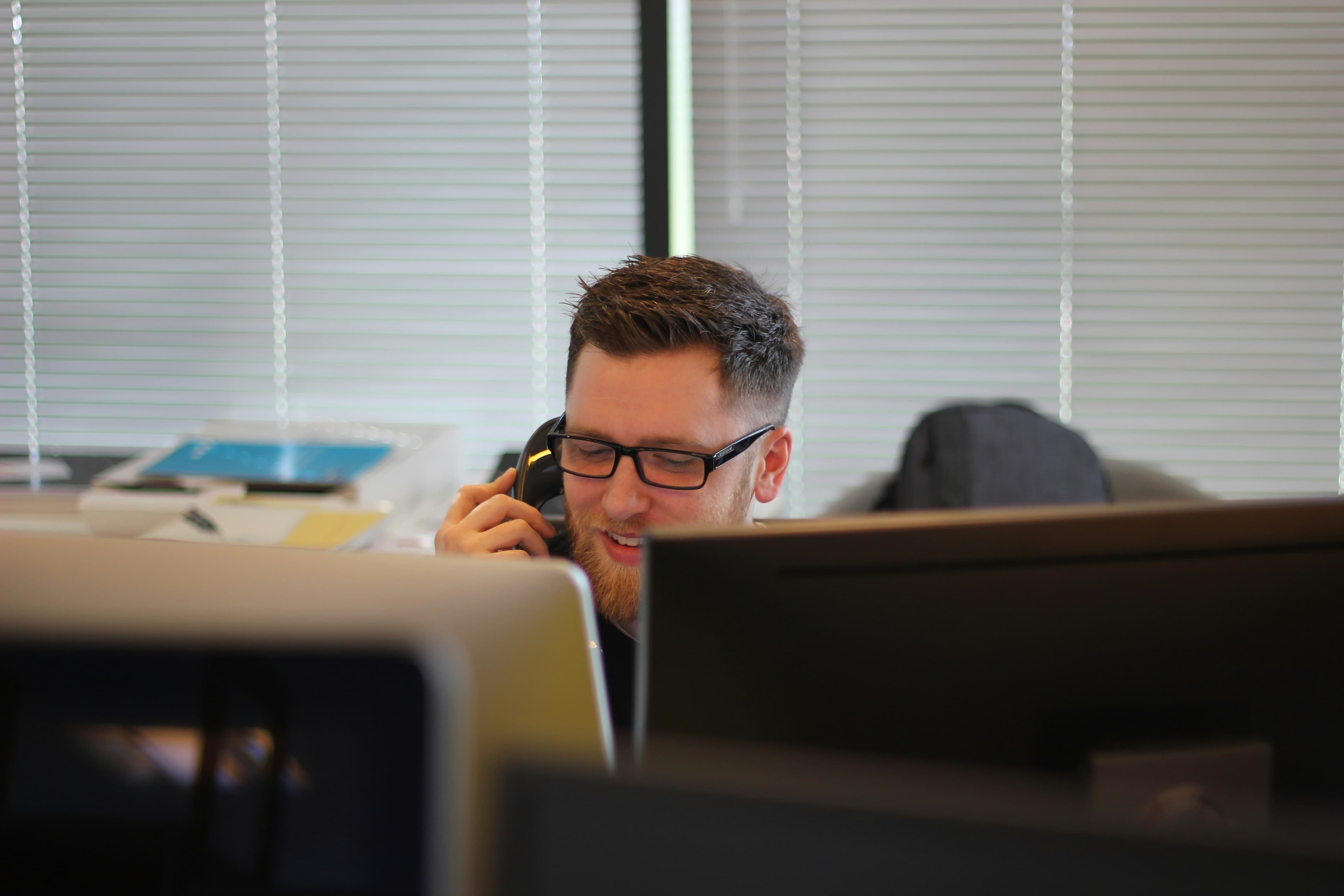 Refinance advisor on the phone helping a customer