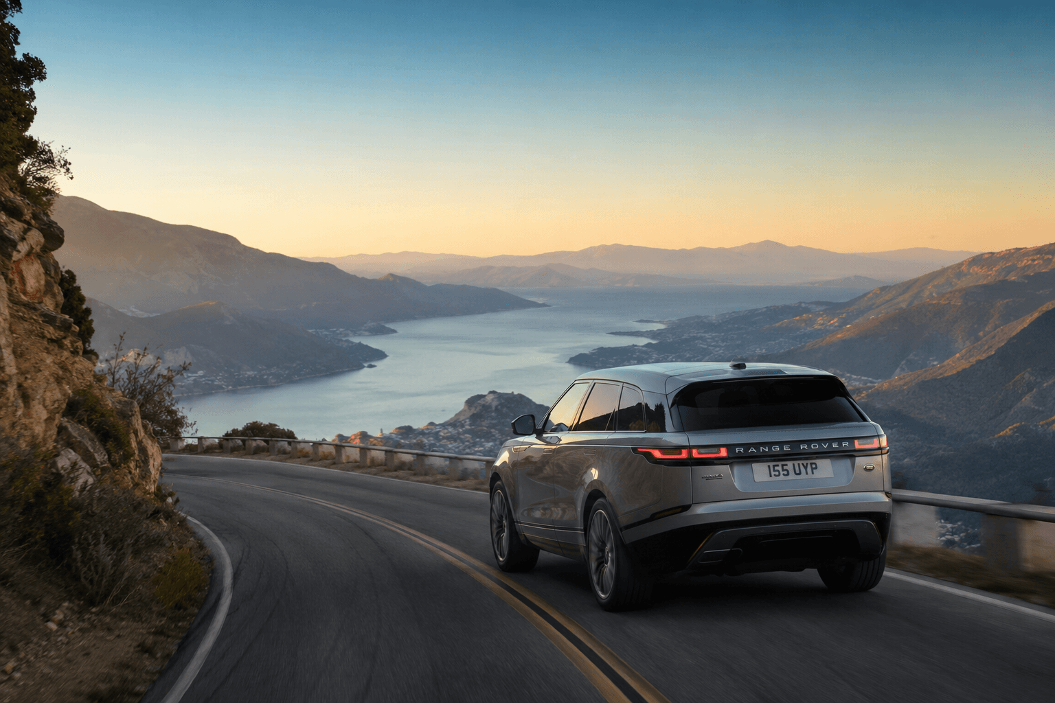 Luxury vehicle on scenic road
